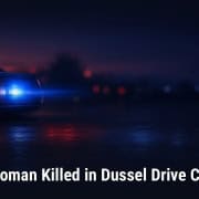Fostoria News Police car lights flashing at night after Dussel Drive crash.